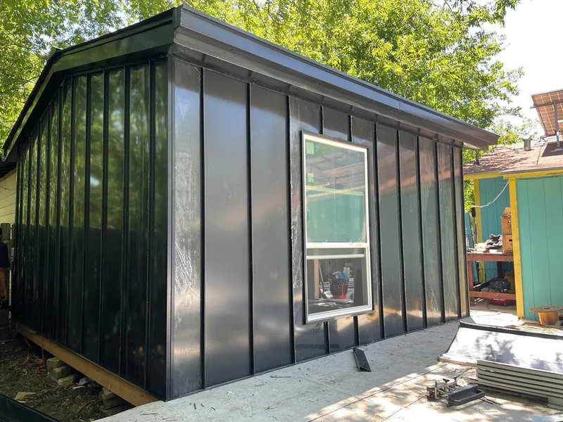 Black standing seam metal wall panels for Roof Inspection in Gardena